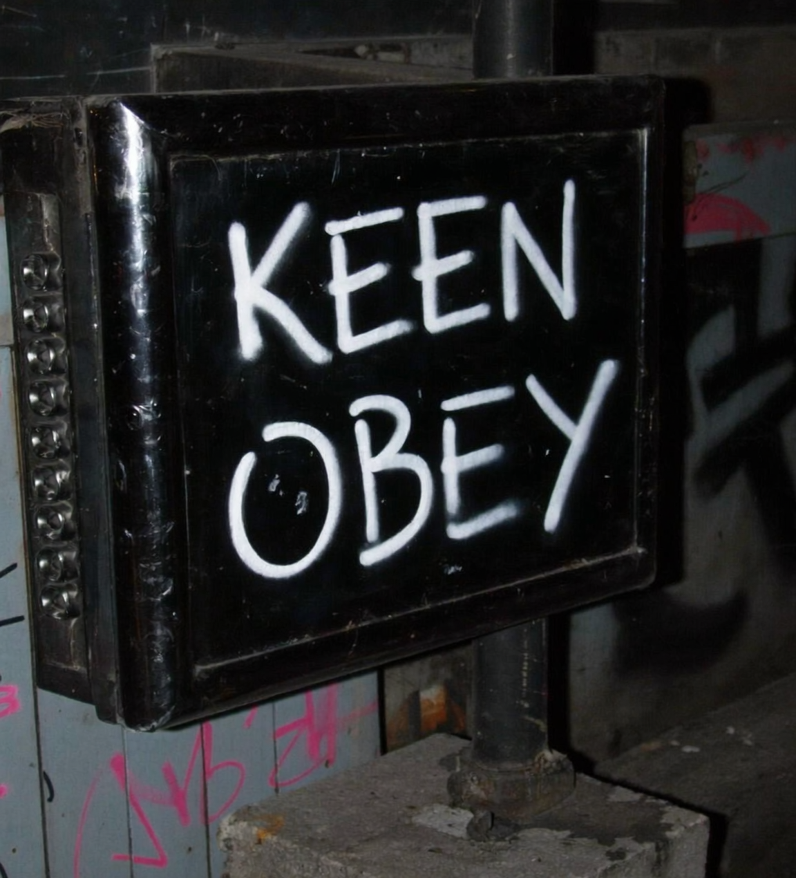 Gold dimensional KEEN OBEY letters